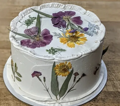 Cake decorated with pressed flowers